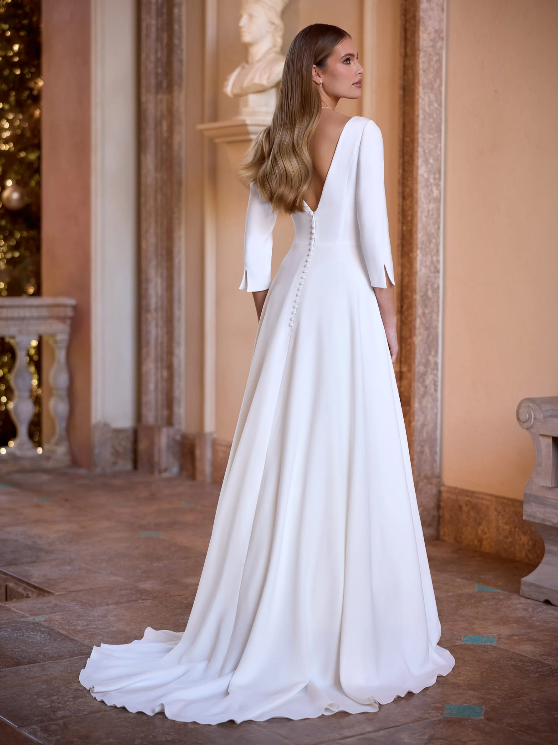 Bianco Evento Kalinda – de achterzijde met de sleep